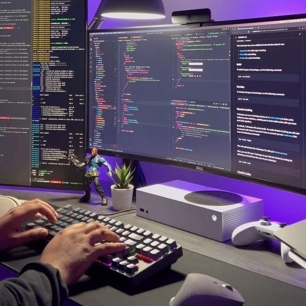 Developer working across multiple screens
